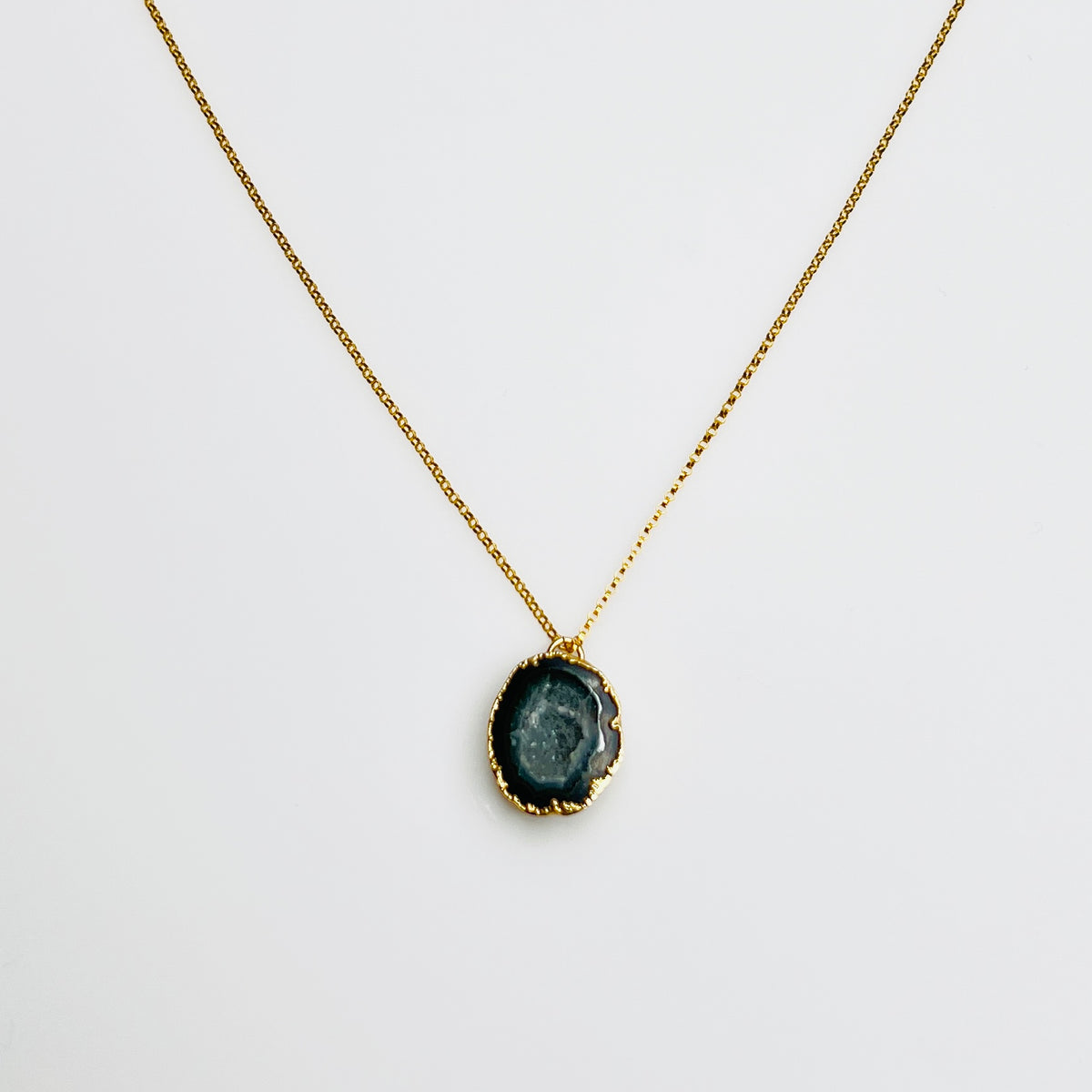 Gold filled necklace with black agate geode pendant