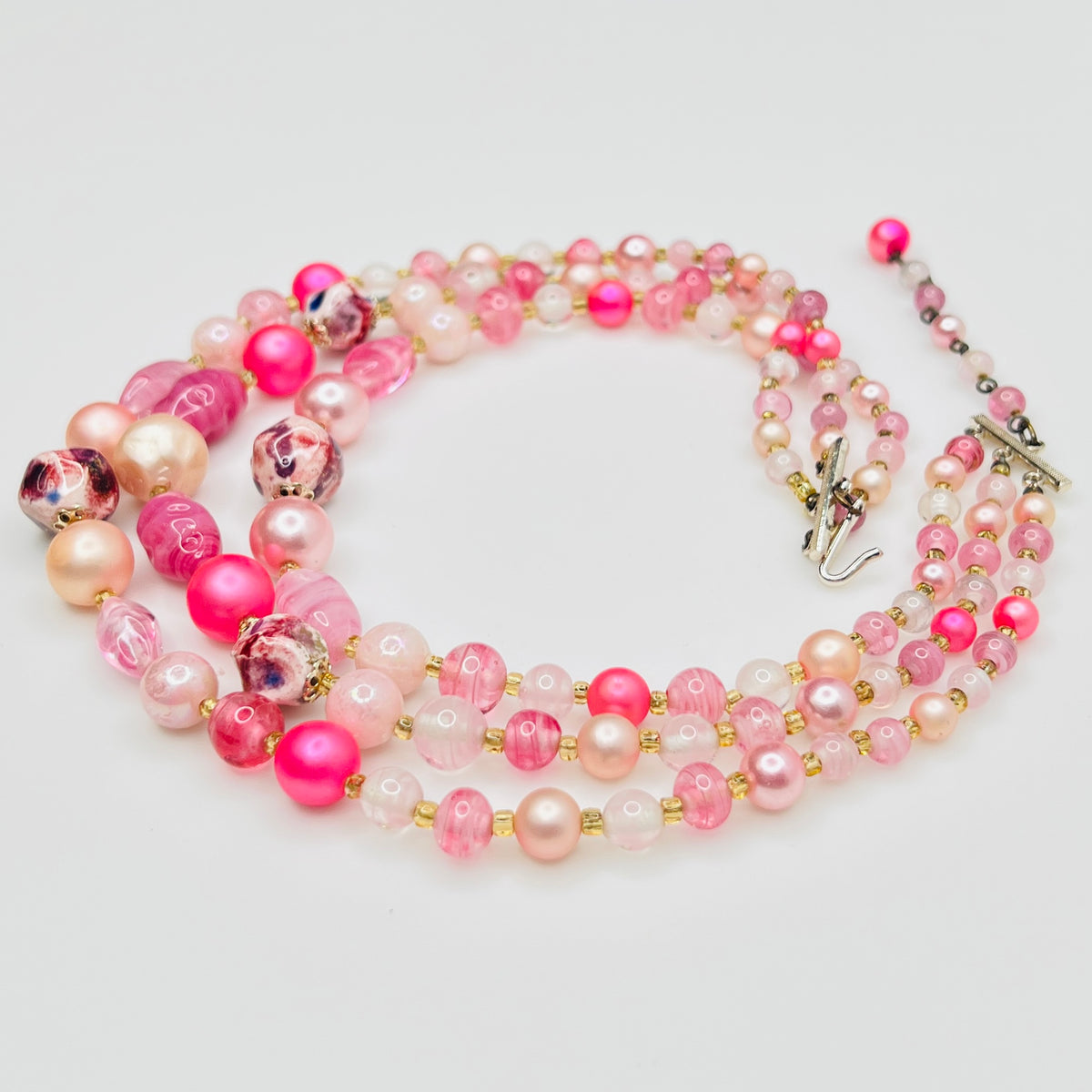 Mixed pink glass and pearl beads multi strand necklace