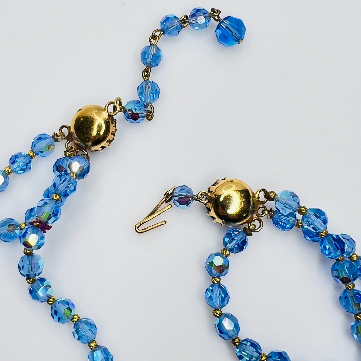 Faceted blue crystal bead necklace with jeweled hook clasp and extender