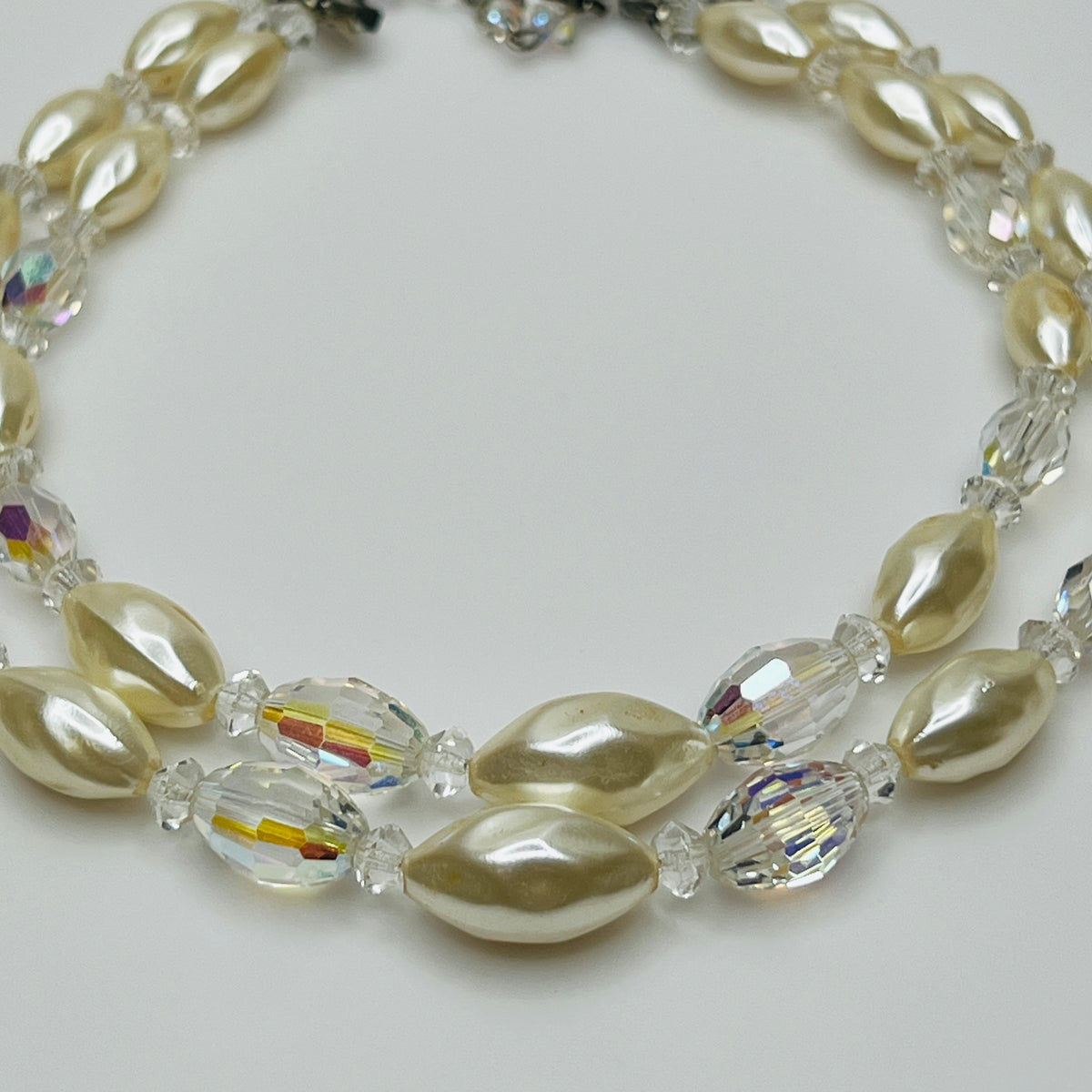 Vintage double strand faux pearl and aurora borealis glass bead necklace with hook clasp