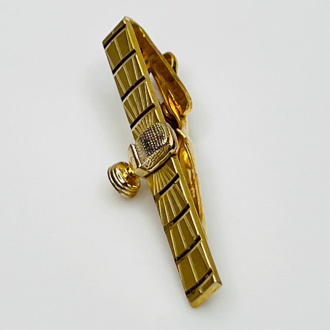 side view 1950s gold-tone tie clip with vintage microphone motif