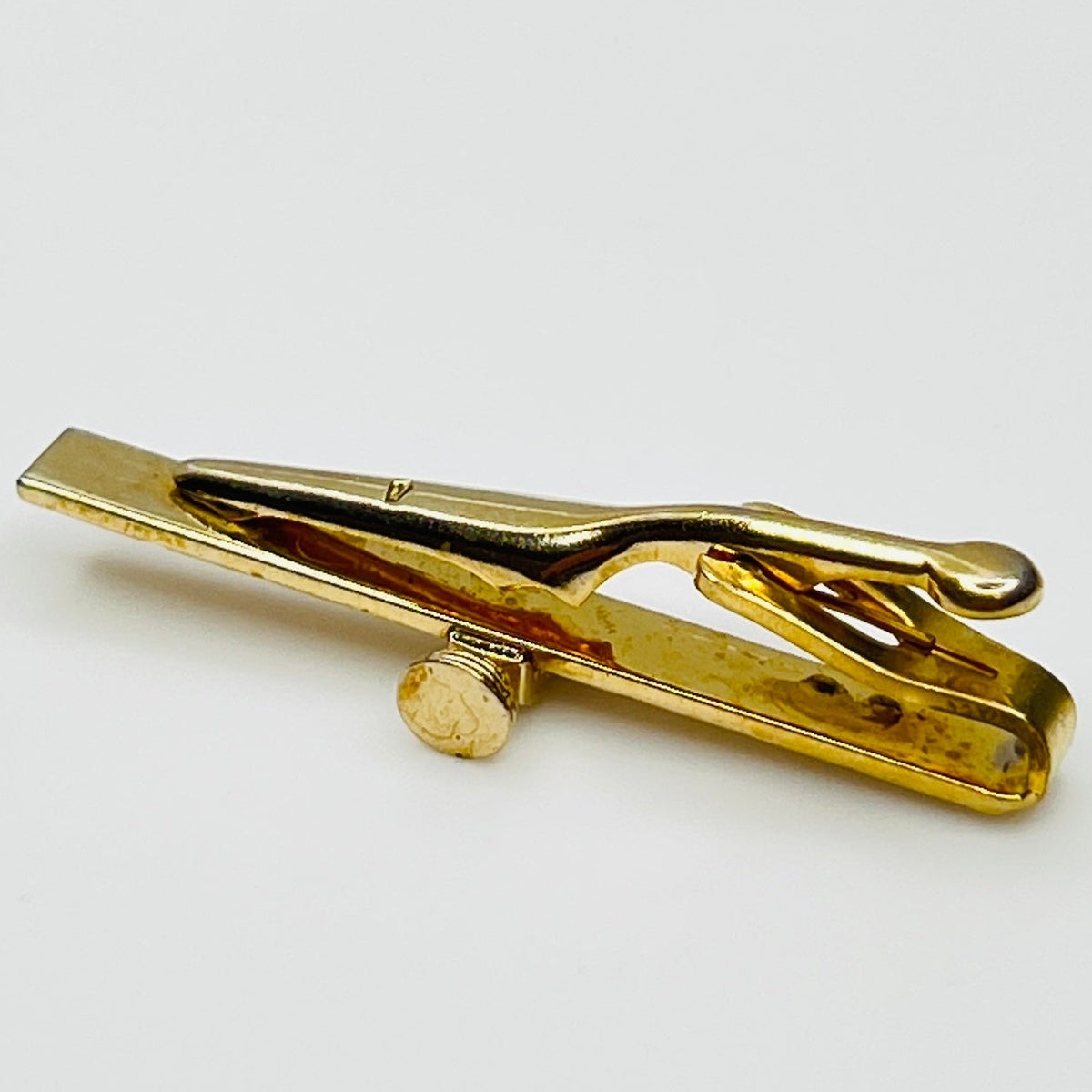 side view 1950s gold-tone tie clip with vintage microphone motif