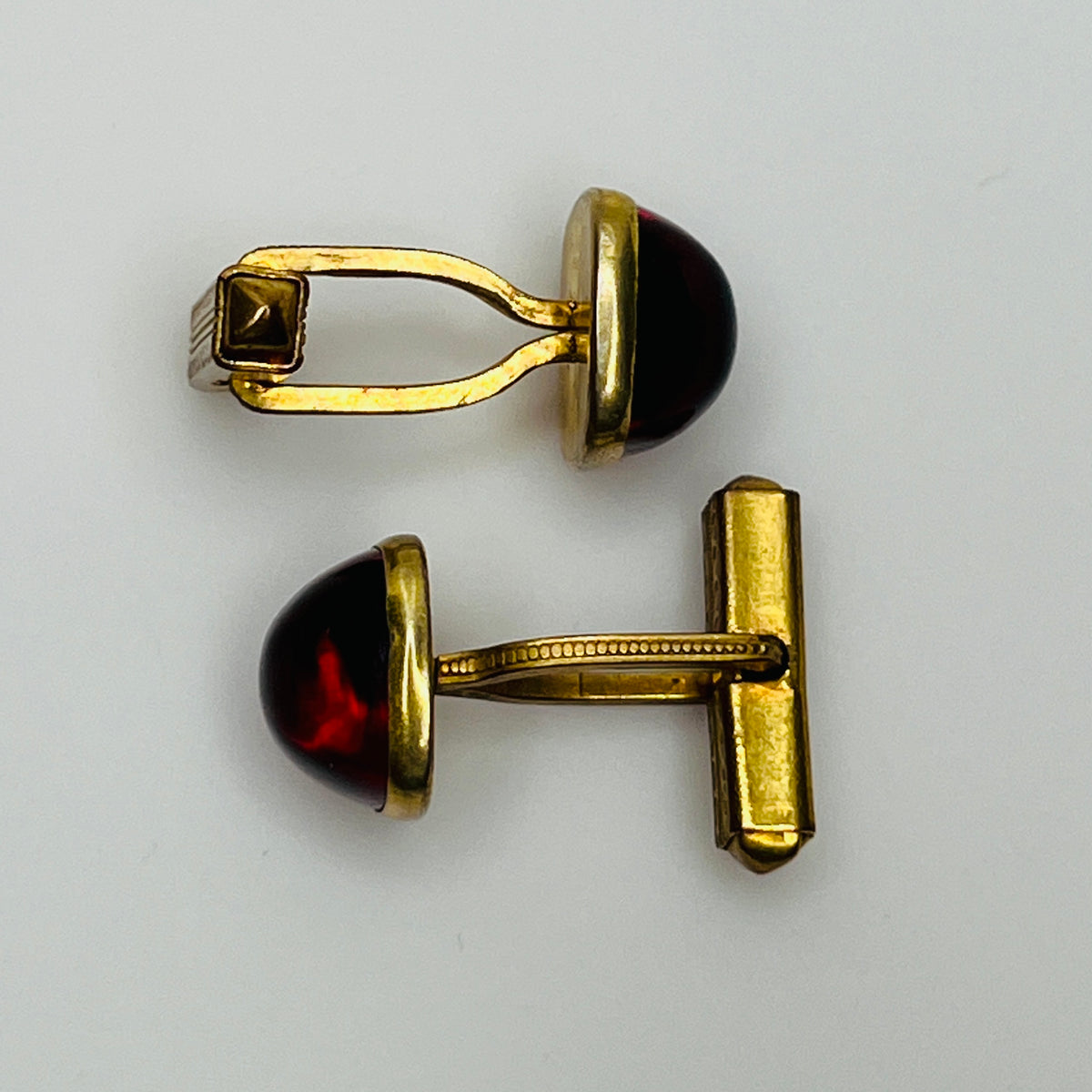 1940s ruby red lucite cufflinks in brass