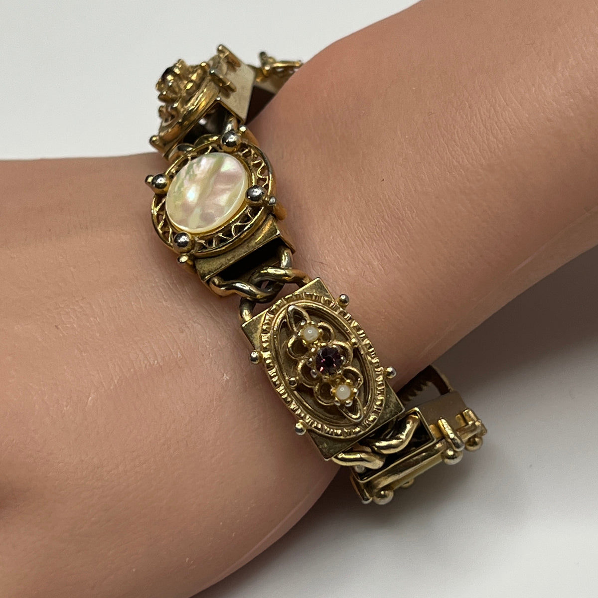 Gold Victorian revival panel bracelet with mother-of-pearl and faux pearls