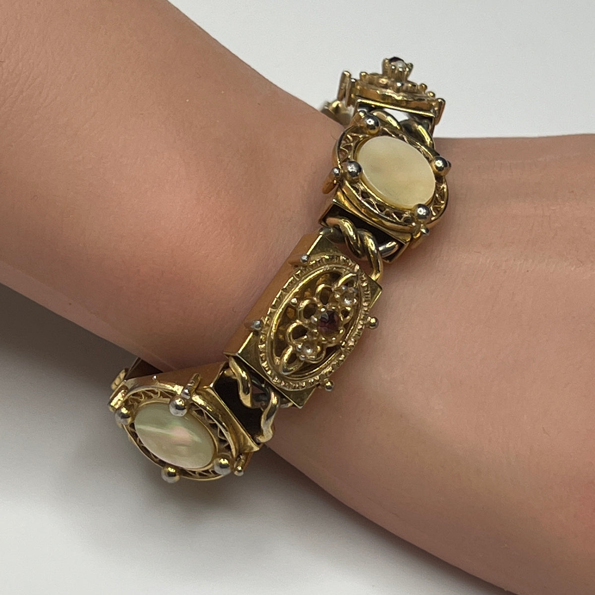 Gold Victorian revival panel bracelet with mother-of-pearl and faux pearls