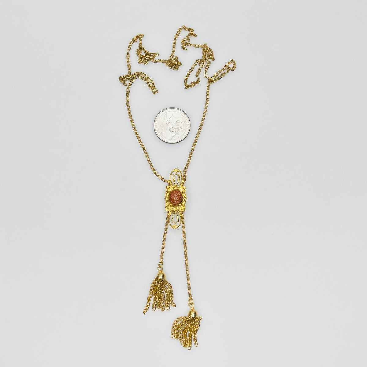 Vintage long gold tone necklace with adjustable slide pendant