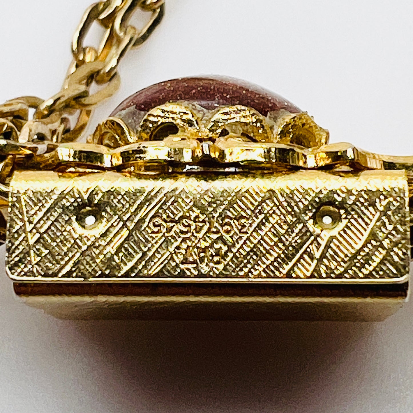 Patent stamped 3974545 gold tone slide detail
