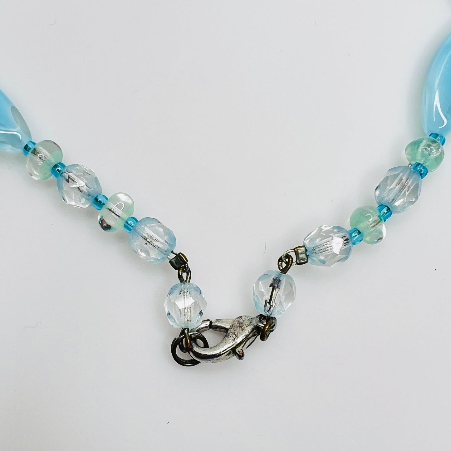 Close-up of aqua and turquoise art glass beads, 1980s necklace
