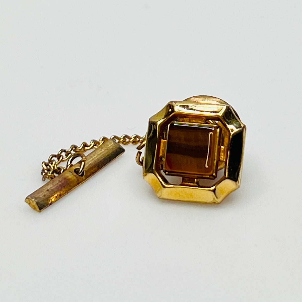 Gold square tie tack with tiger eye stone, vintage Anson design