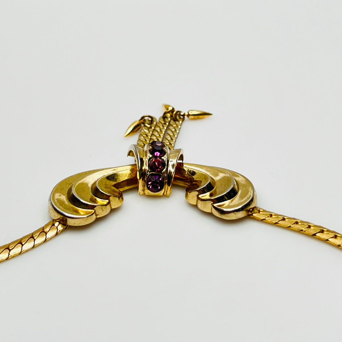 Vintage gold tone choker with purple glass rhinestones