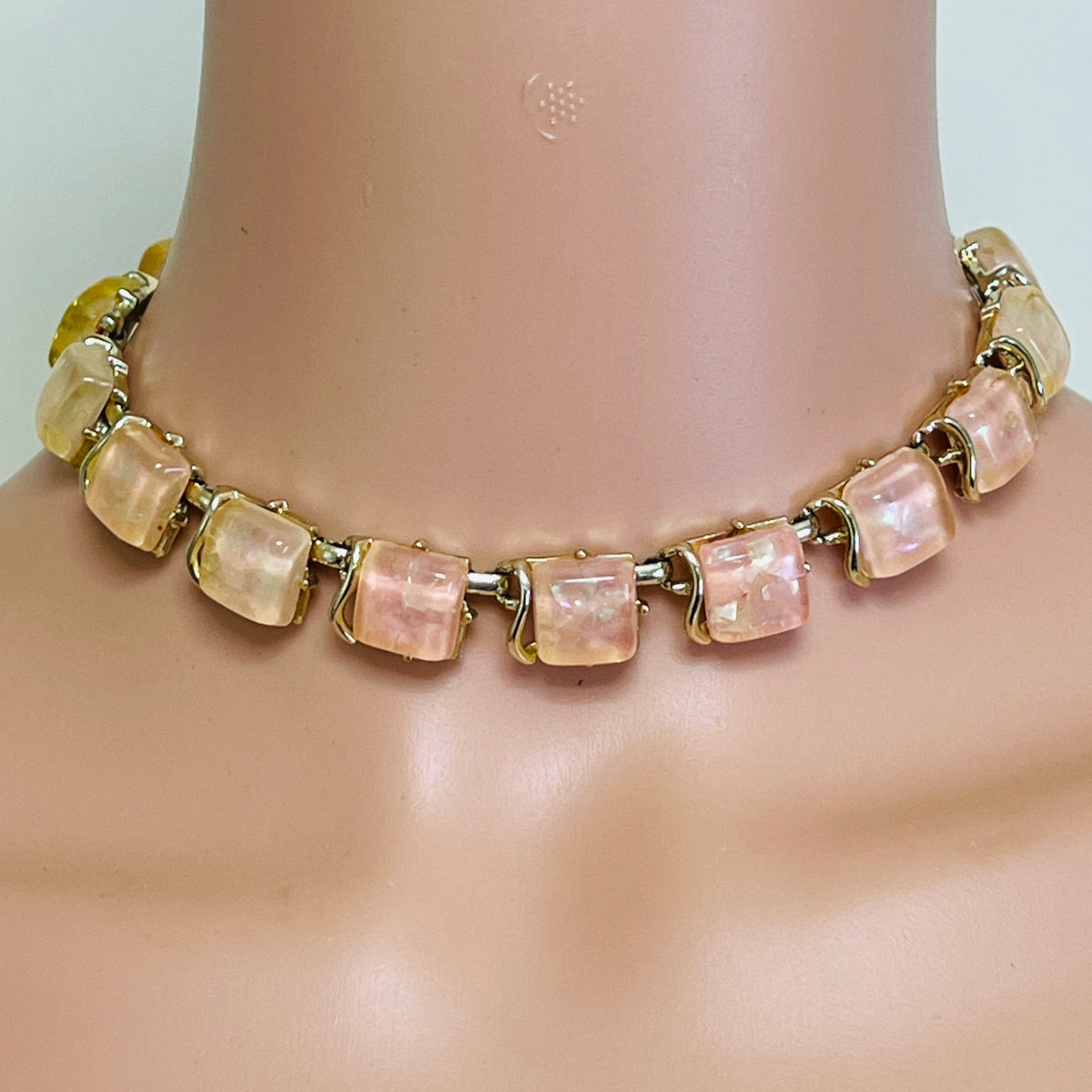 1950s choker necklace on mannequin with square linked Lucite design