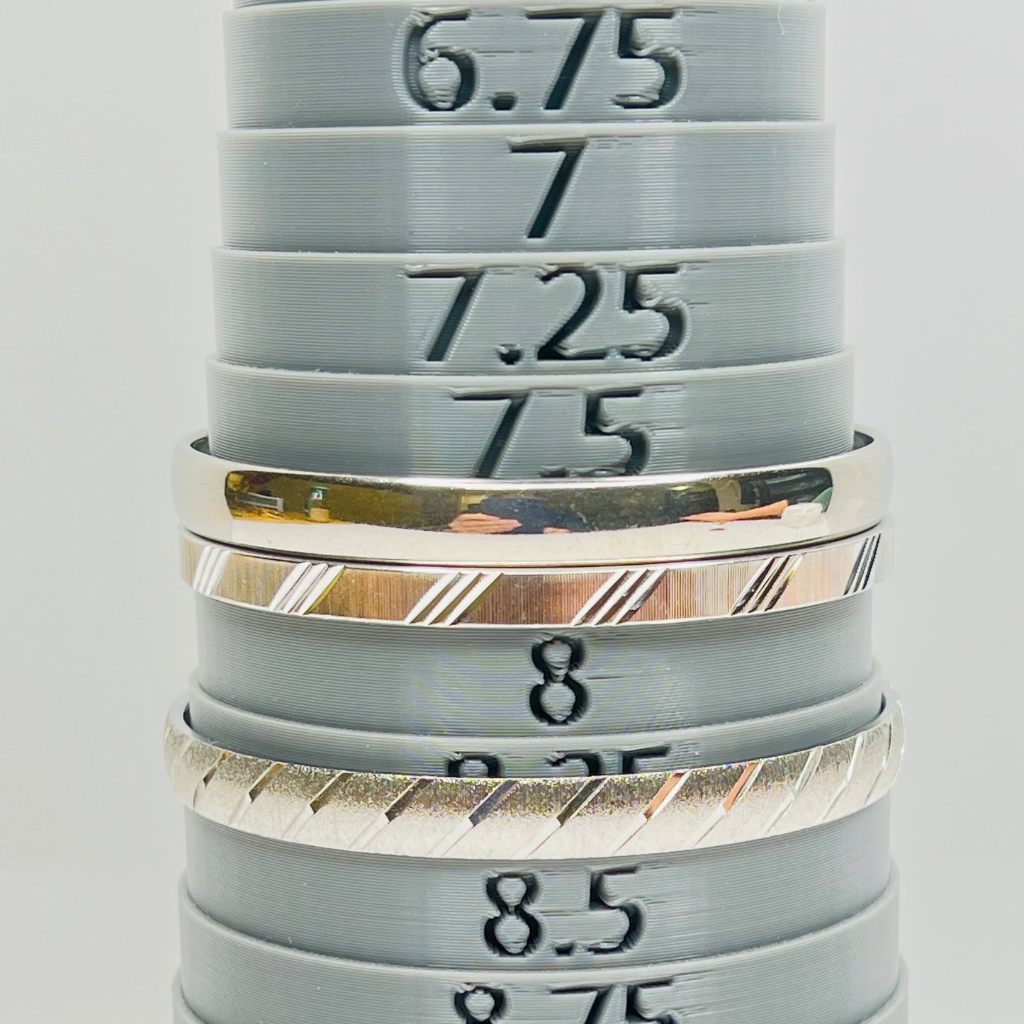 Monet silver tone bangle set with etched diagonal pattern