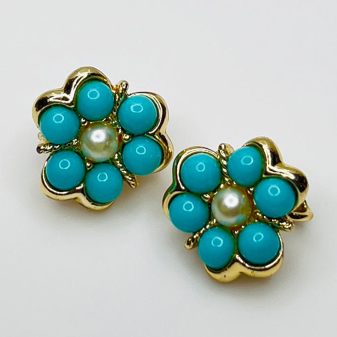 Matching clip-on earrings with gold-tone floral setting and turquoise beads