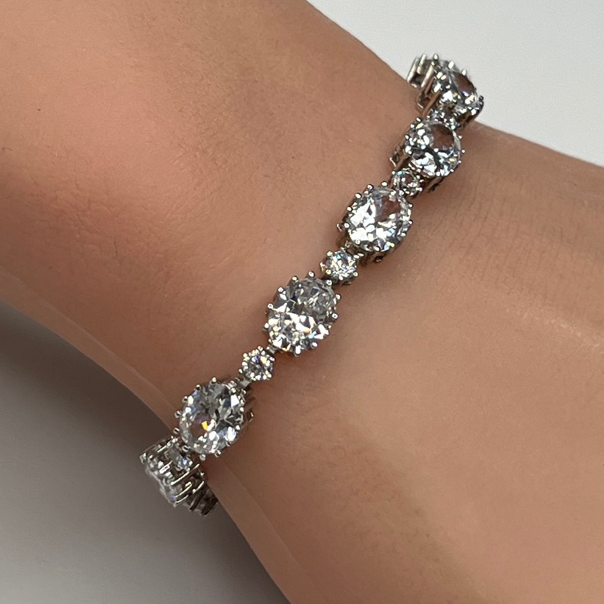 Stauer sterling silver CZ tennis bracelet on wrist