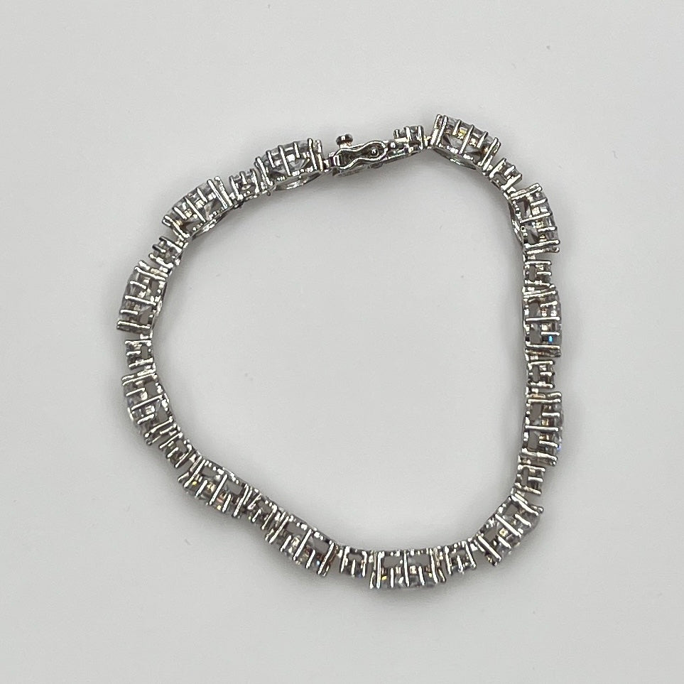 Full view of bracelet with alternating oval and round stones