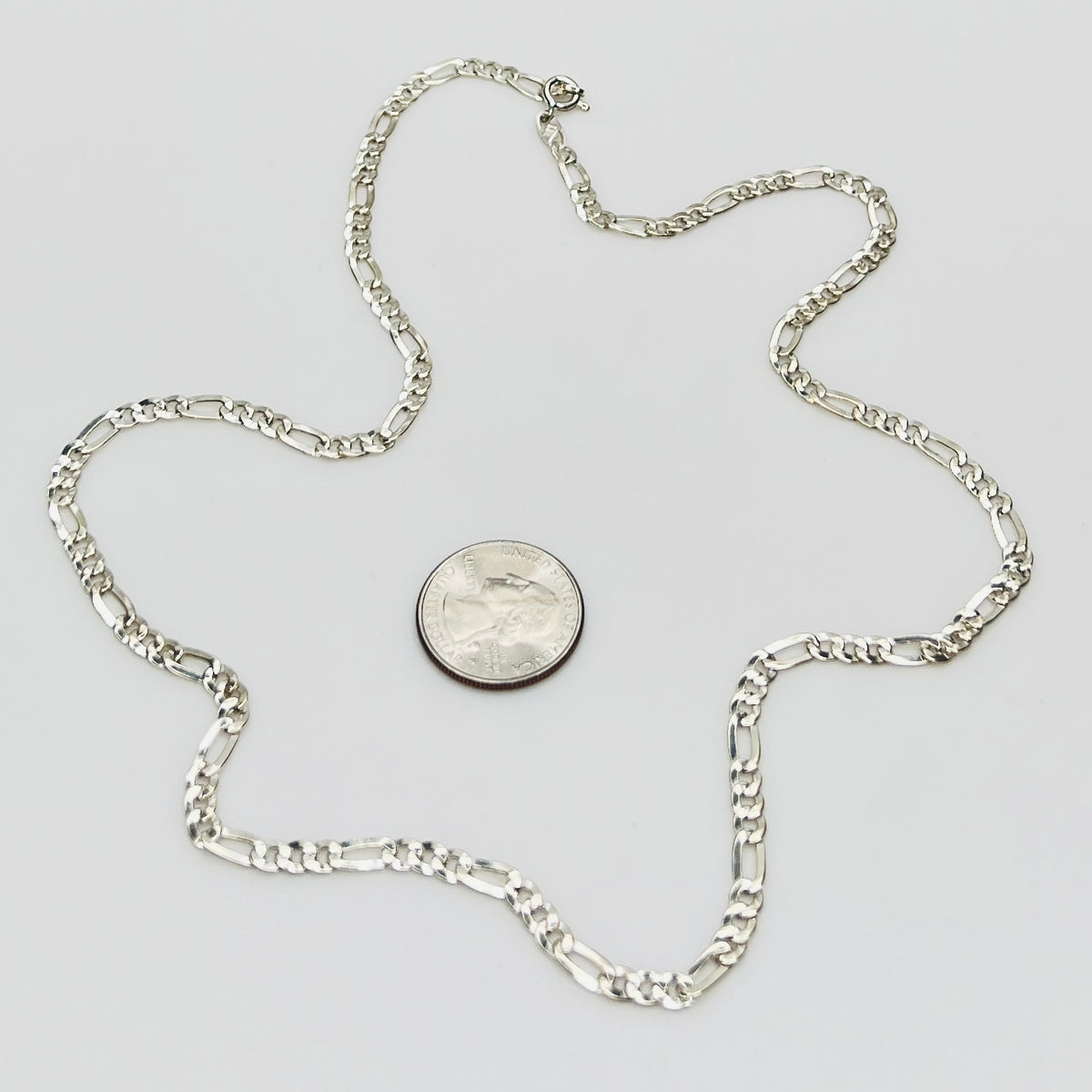 Sterling silver Figaro chain necklace with polished finish