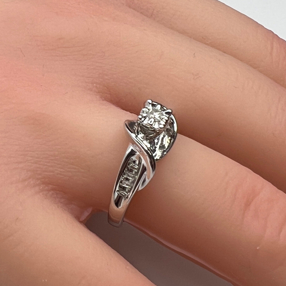 Sterling silver diamond ring by Forever Bride shown on finger
