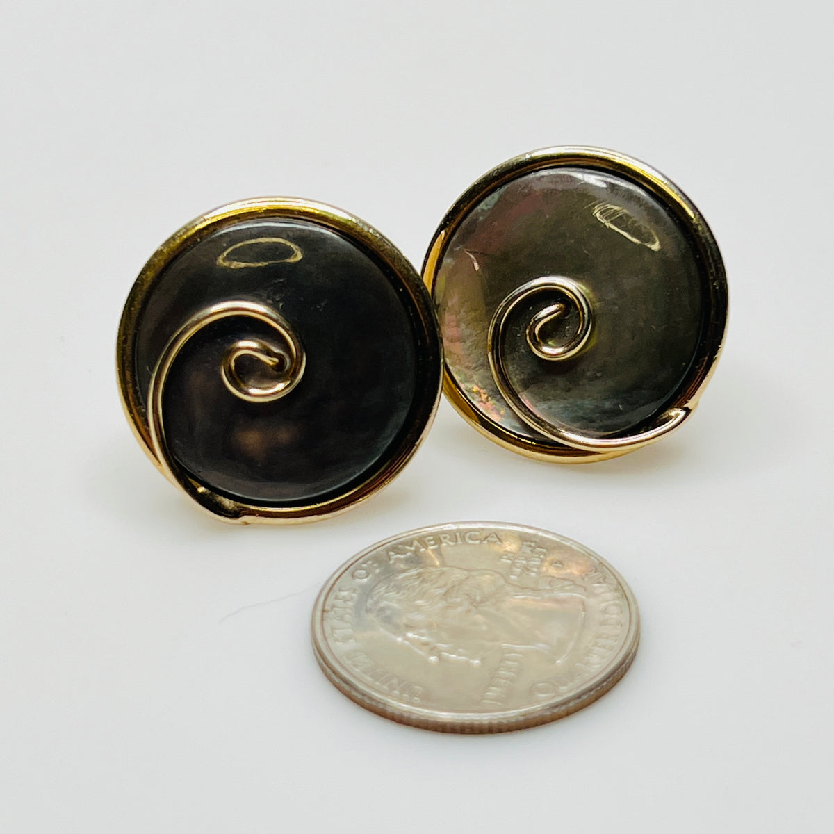 Round abalone cufflinks with gold swirl overlay, iridescent finish, 1960s Swank design