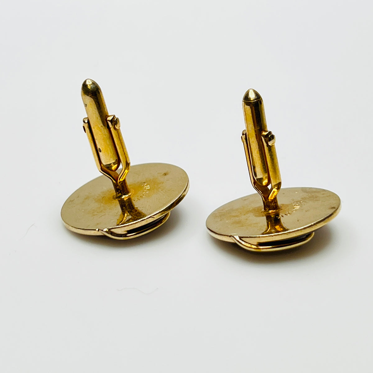 Round abalone cufflinks with gold swirl overlay, iridescent finish, 1960s Swank design
