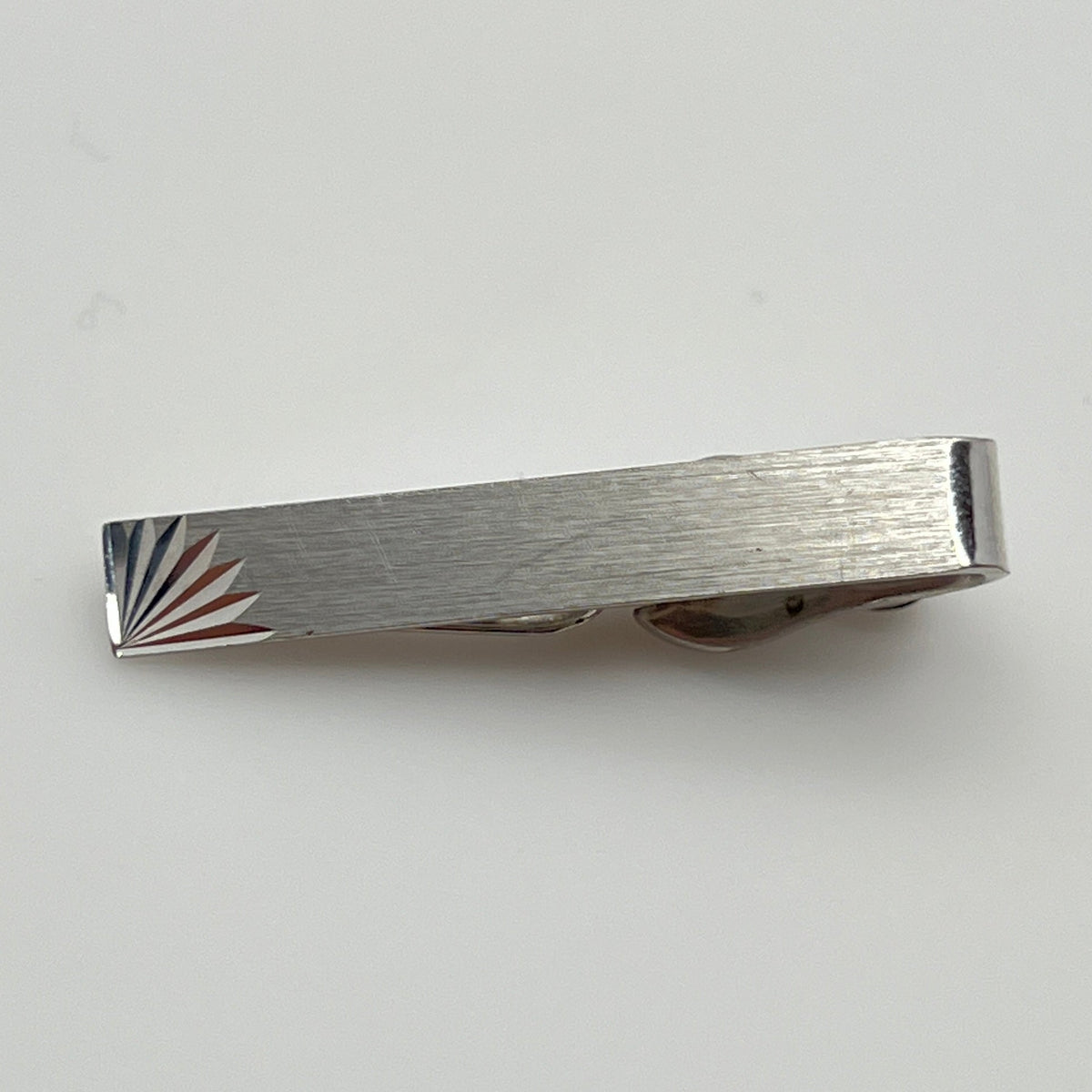Brushed silver-tone Swank tie clip with etched fanburst detail, Mid-Century style