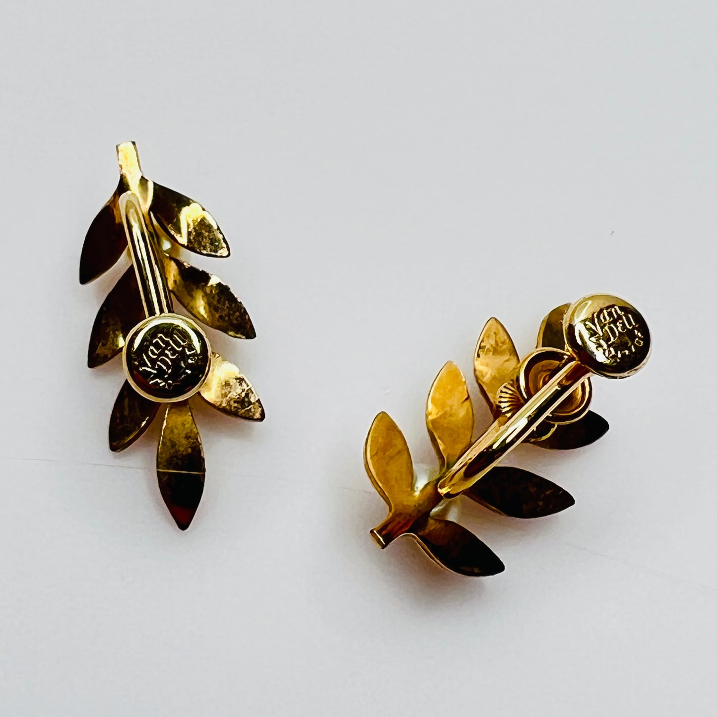 Van Dell screw-back earrings with pearl accents and gold leaf design
