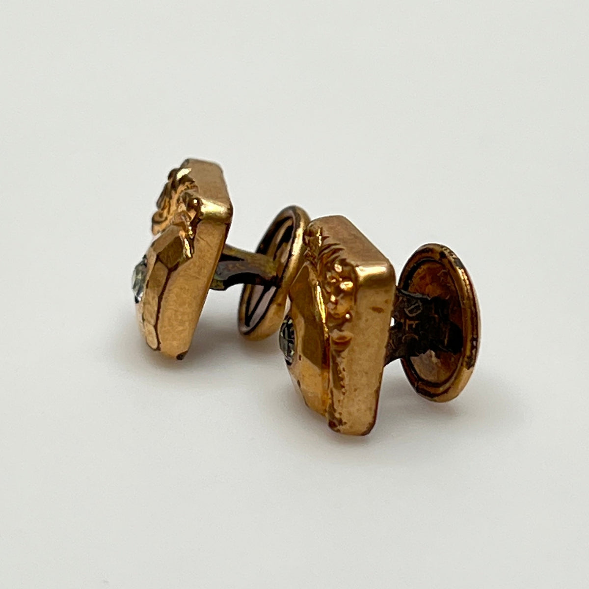 Antique rose gold-tone cufflinks with paste stone and scrollwork, stamped Pat Dec 1883