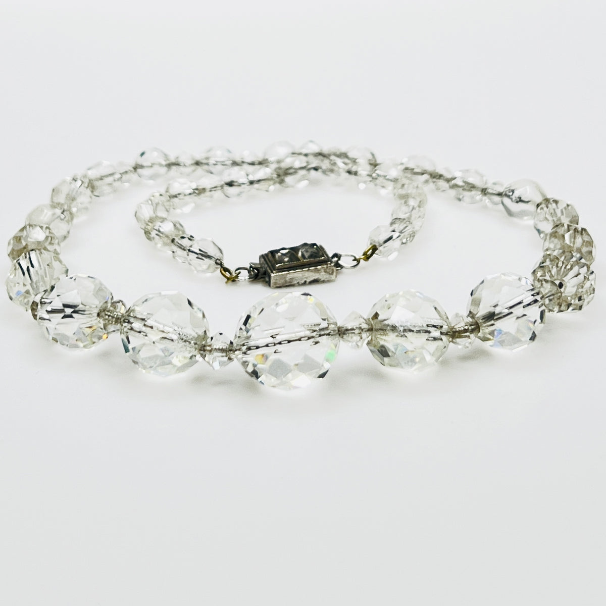 Close view of faceted crystal beads with bicone spacers