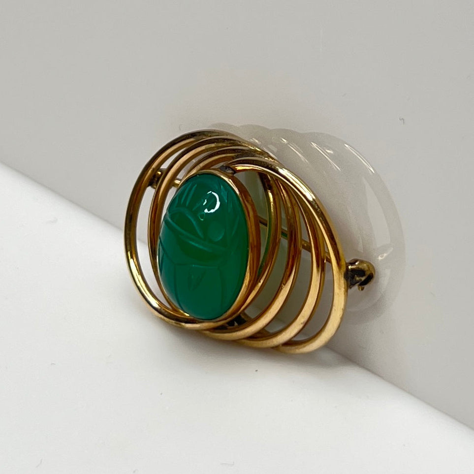 1950s gold-filled scarab brooch with green carved glass