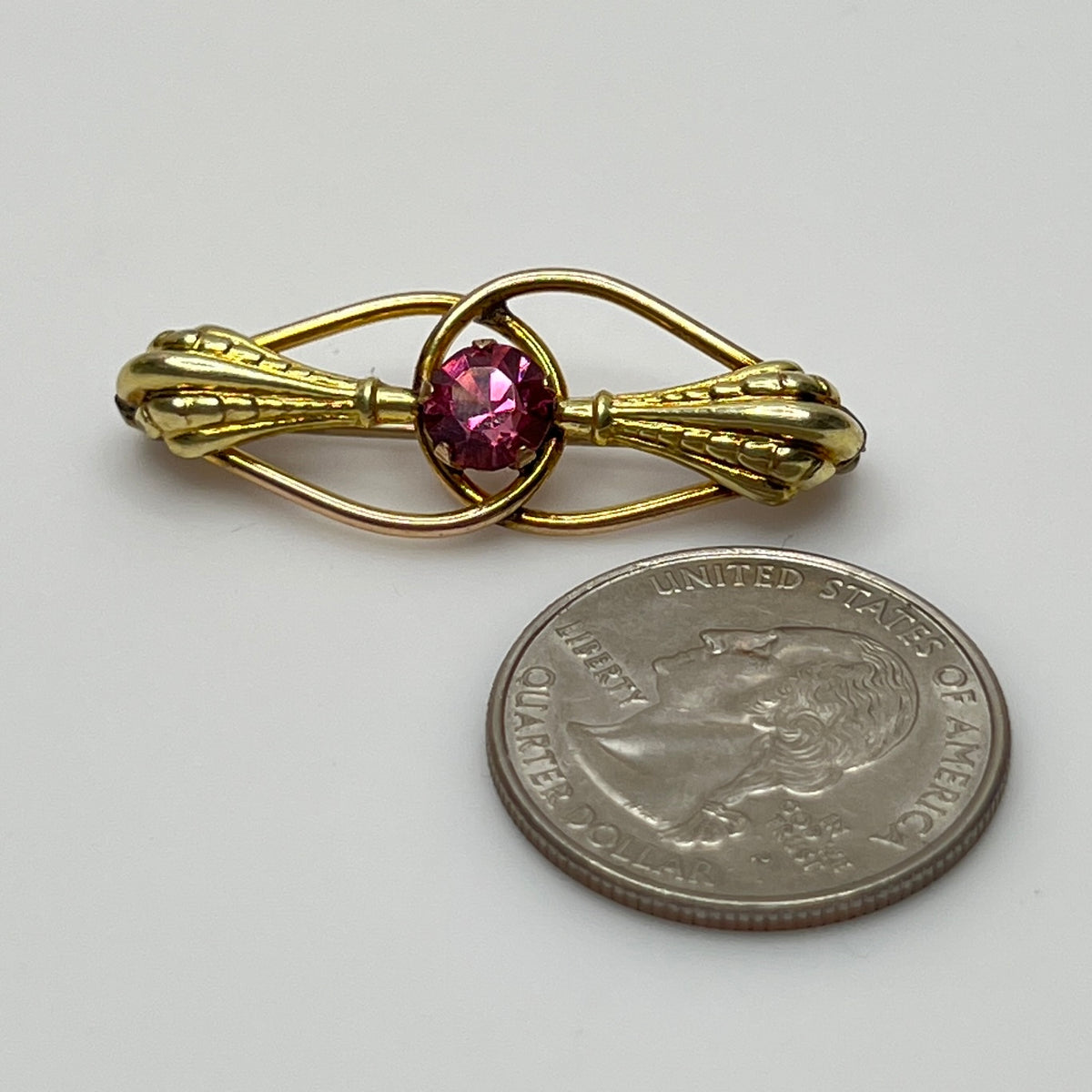 AMCO Art Nouveau bar brooch with pink rhinestone and 10K gold fill