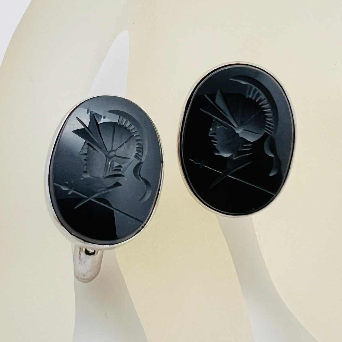 Close-up of Anson cufflink with sterling silver setting