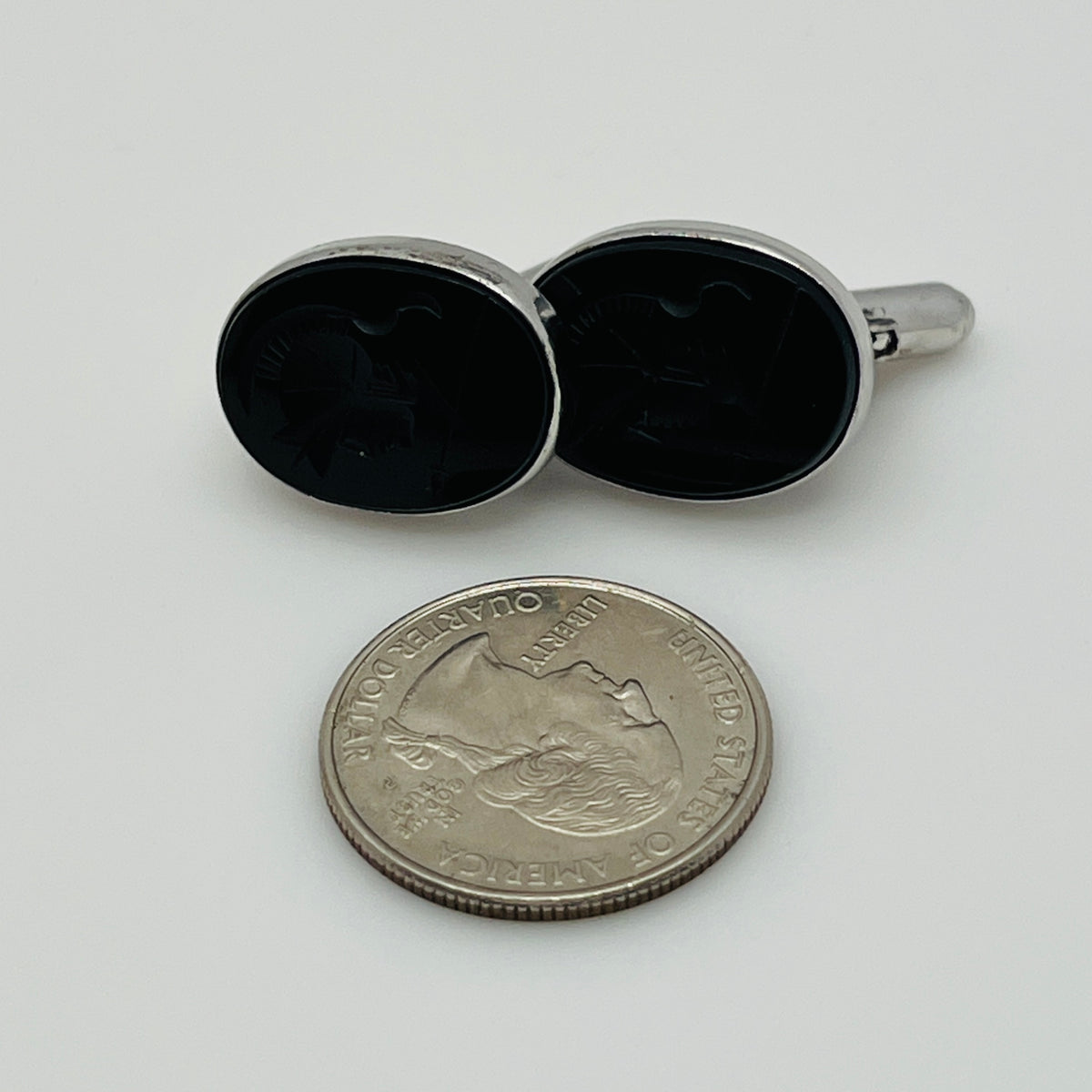 Sterling silver cufflinks with black Roman centurion intaglios, front view