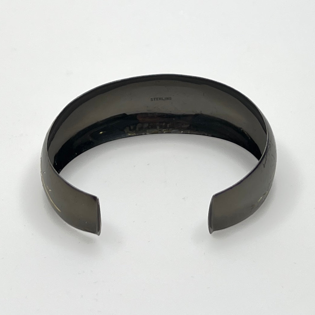 Blackened sterling cuff bracelet with Japanese temple and floral design