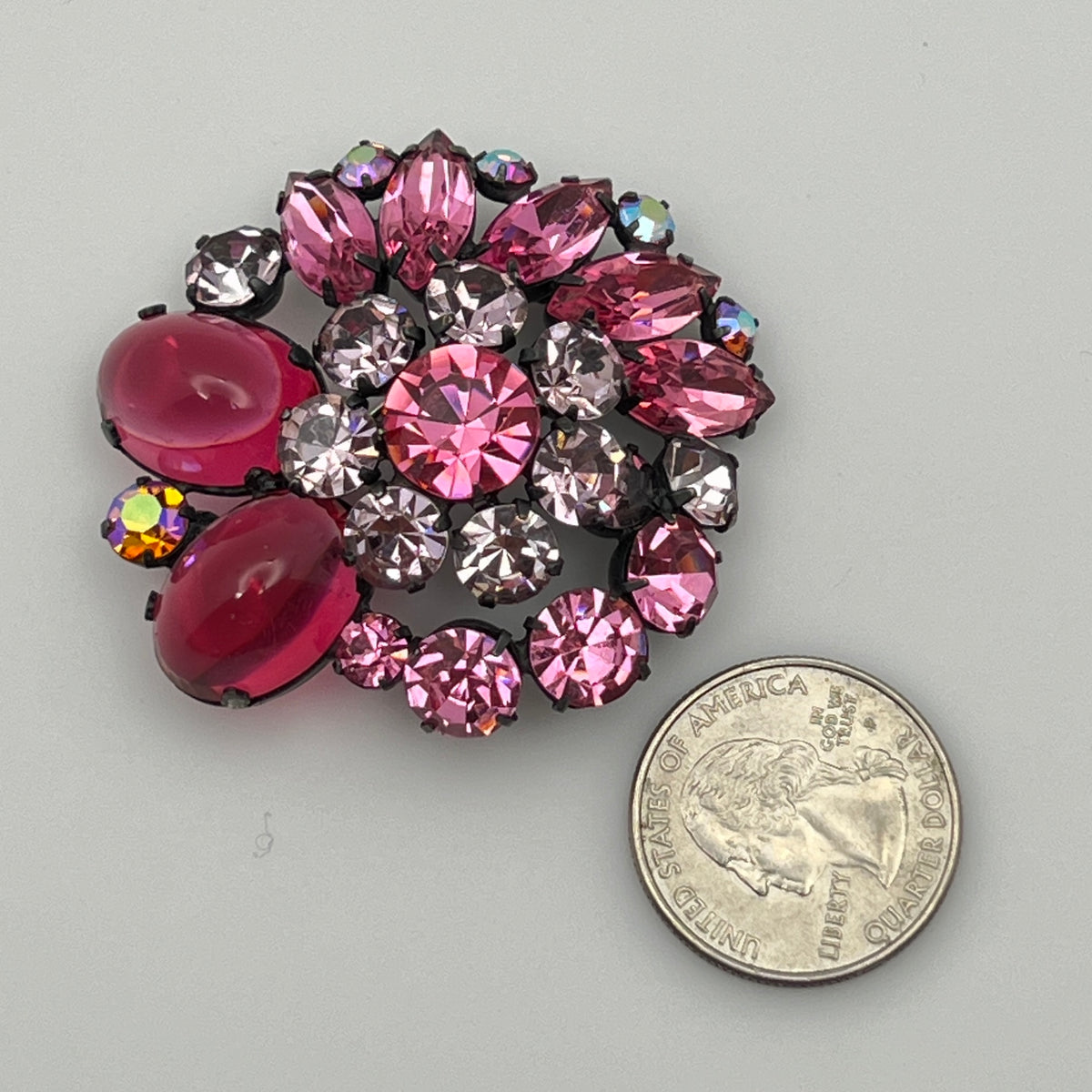 1960s pink glass rhinestone brooch with matching aurora borealis earrings