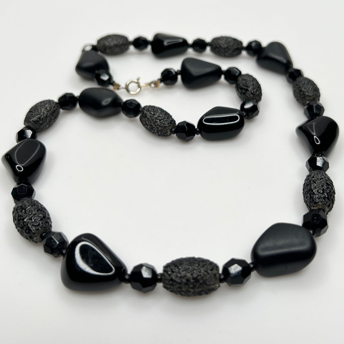 1980s black bead necklace coiled flat, 24 inches long