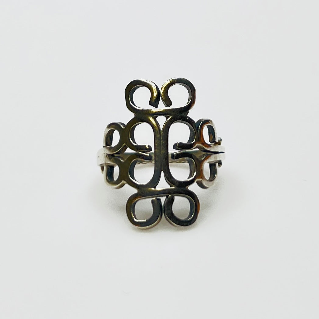 Modernist vintage ring with bold swirl motif in sterling silver