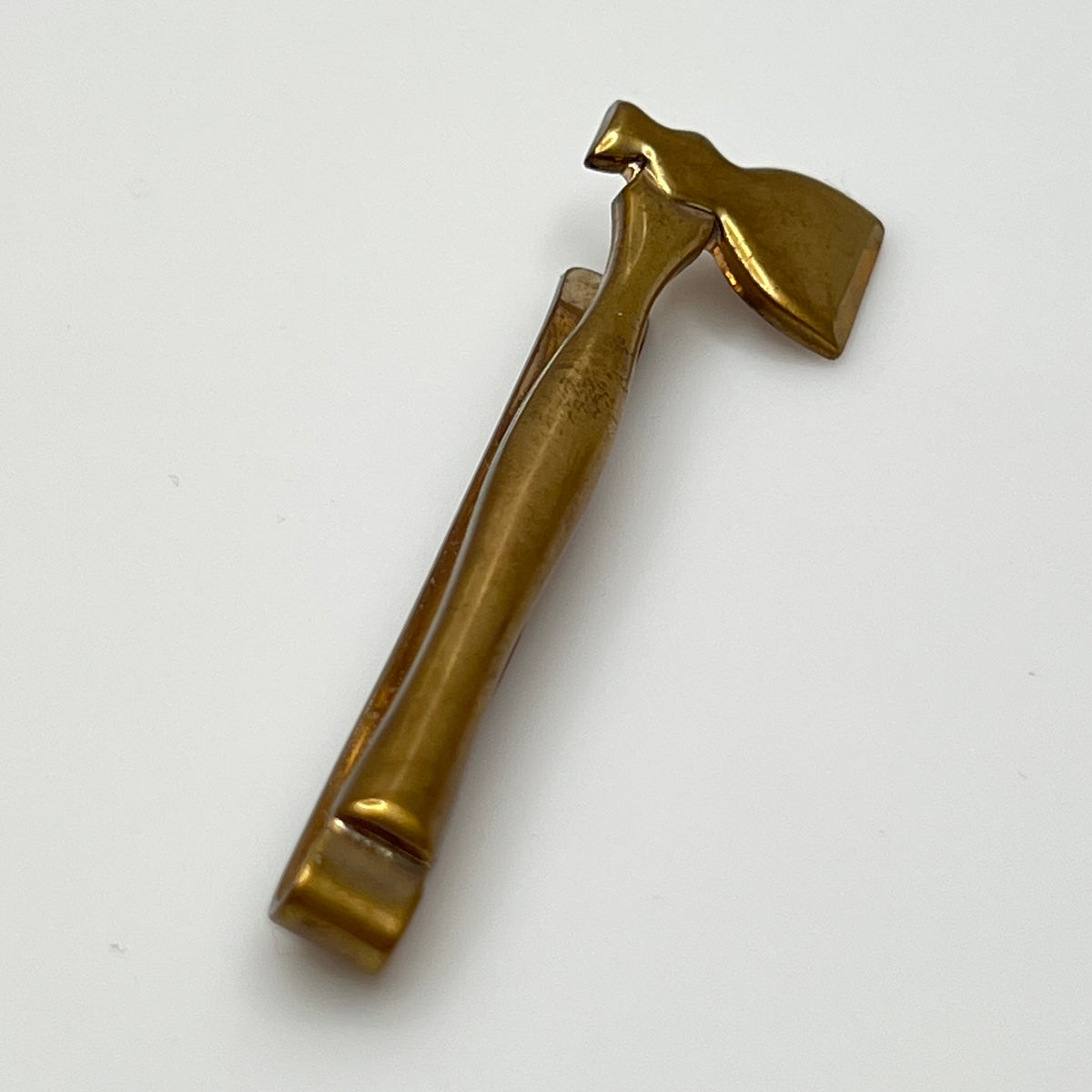 Rustic vintage tie bar shaped like a hatchet, pressure-fit style