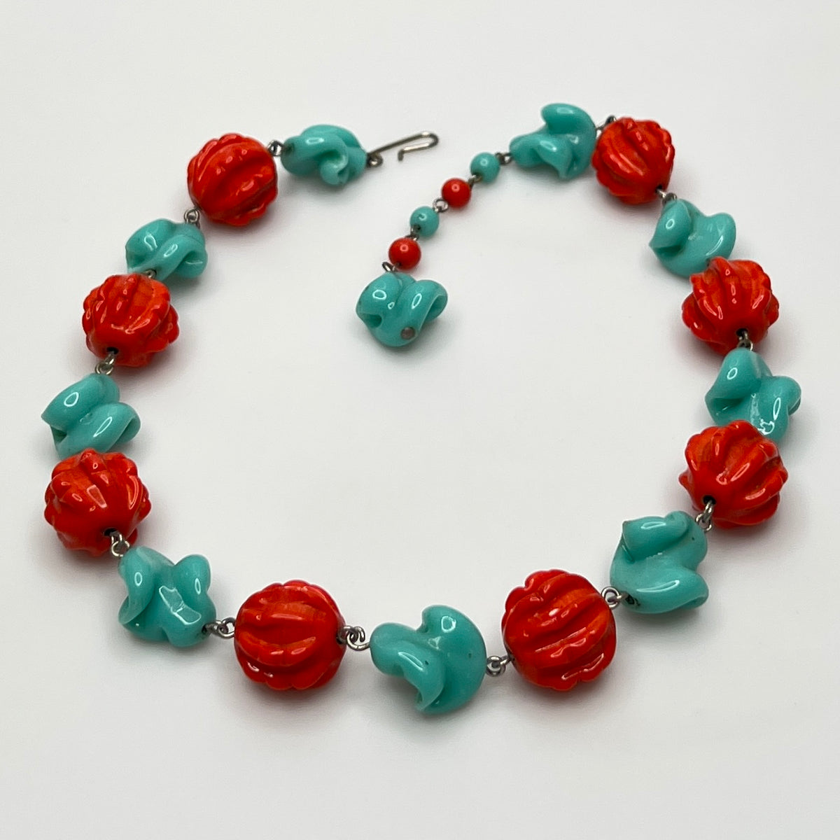 Twisted aqua and carved coral beads in retro choker necklace