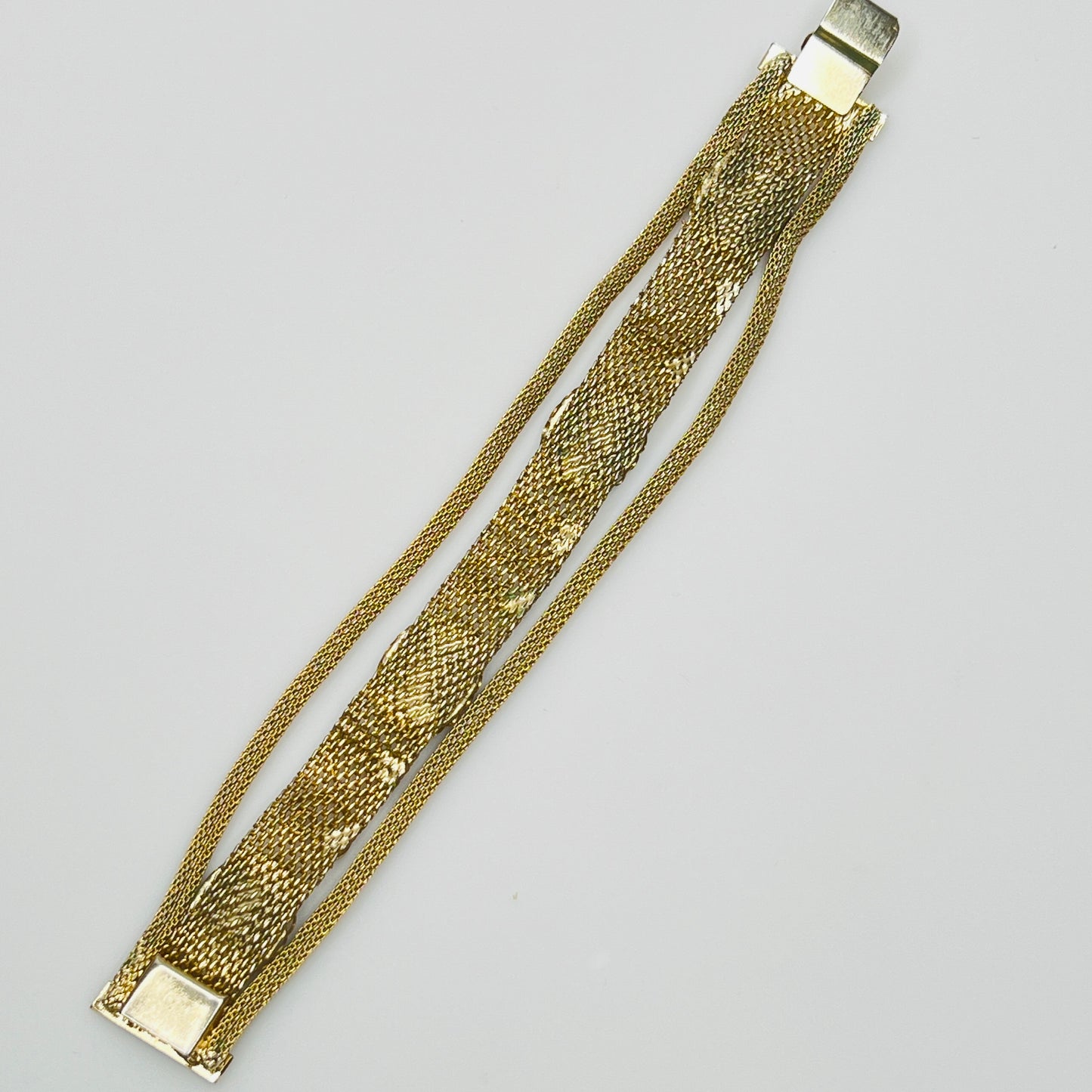 Vintage gold mesh bracelet with four floral cabochons