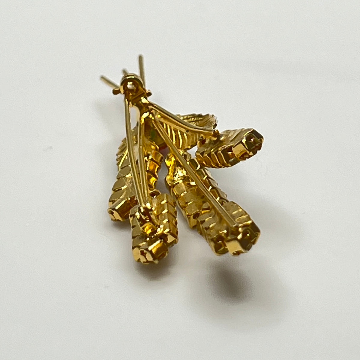 1950s rhinestone brooch and earring set with amber stones, enamel leaves, and cat tail motif.