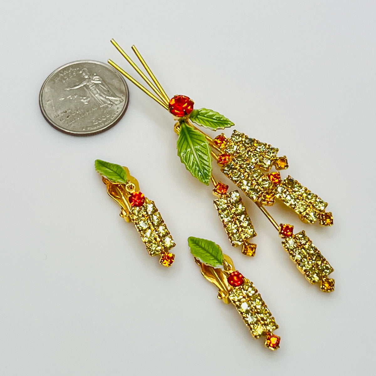 1950s rhinestone brooch and earring set with amber stones, enamel leaves, and cat tail motif.