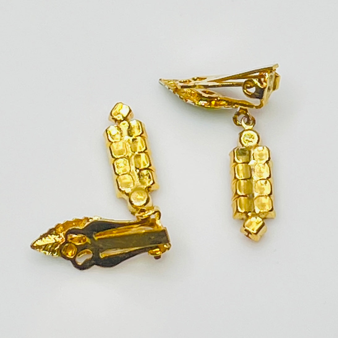 1950s rhinestone brooch and earring set with amber stones, enamel leaves, and cat tail motif.