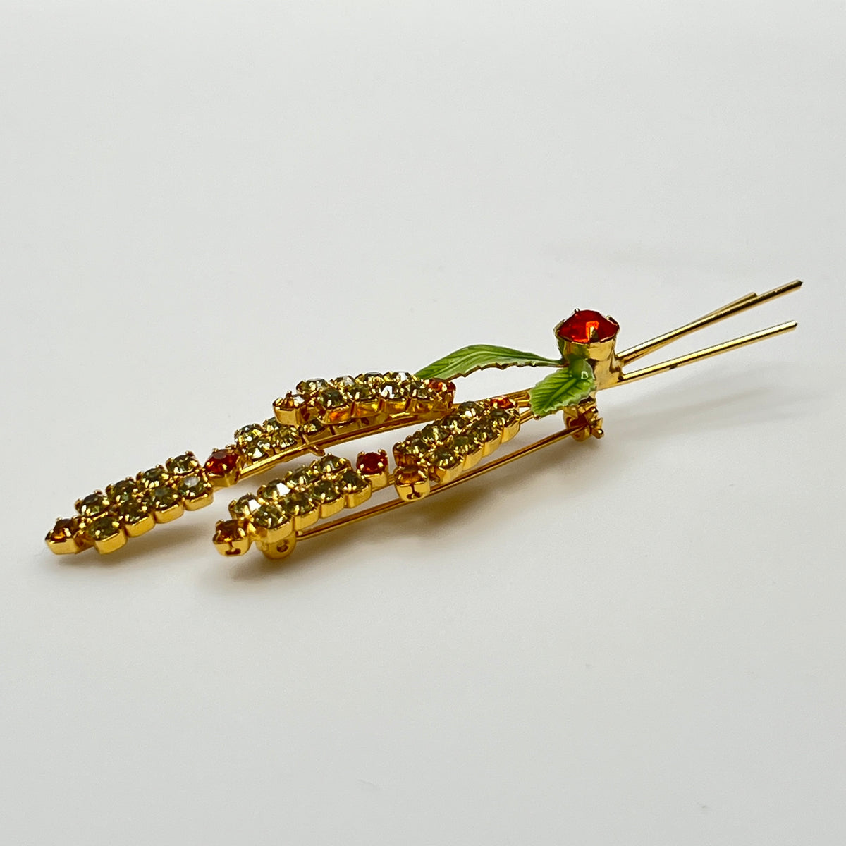 1950s rhinestone brooch and earring set with amber stones, enamel leaves, and cat tail motif.
