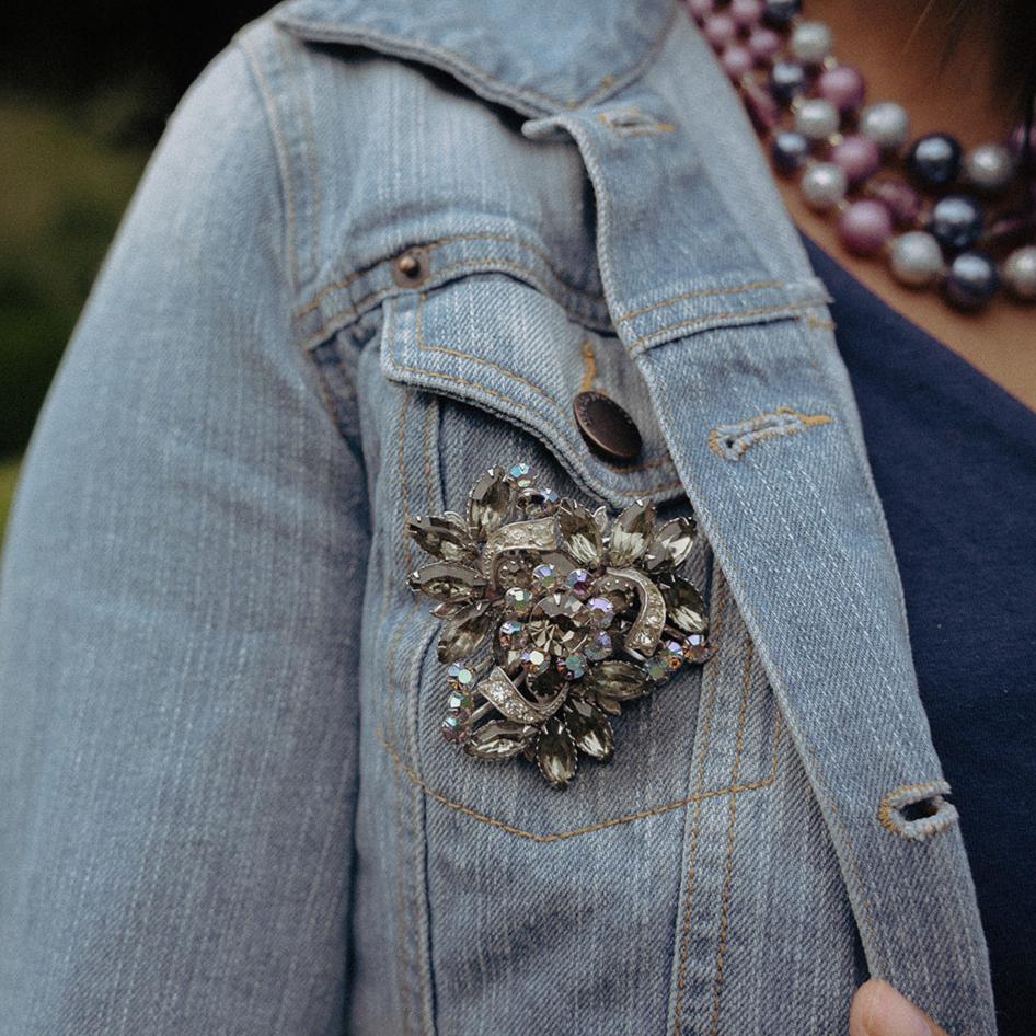 Close-up of aurora borealis floral cluster in vintage statement brooch