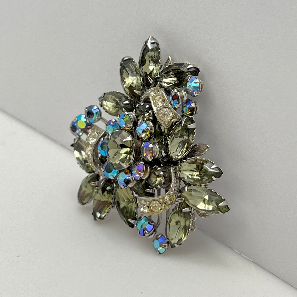 Vintage brooch with olive green navette rhinestones and aurora borealis crystals