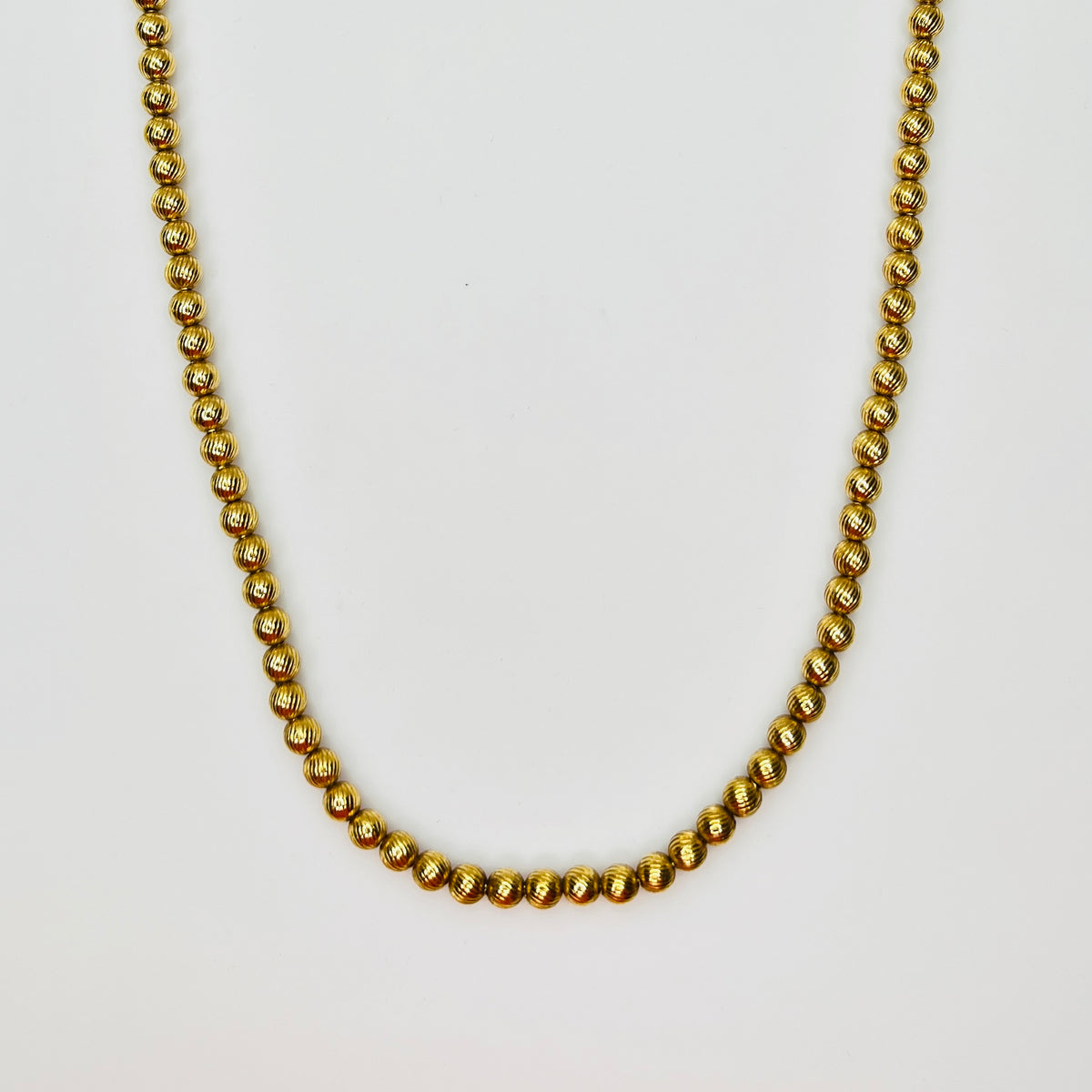 Monet vintage gold bead necklace textured 1970s long strand