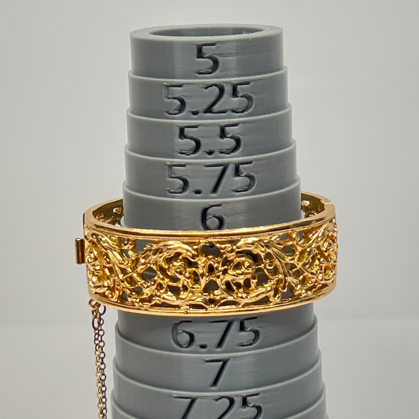 Vintage Napier gold filigree hinged bangle bracelet with safety chain