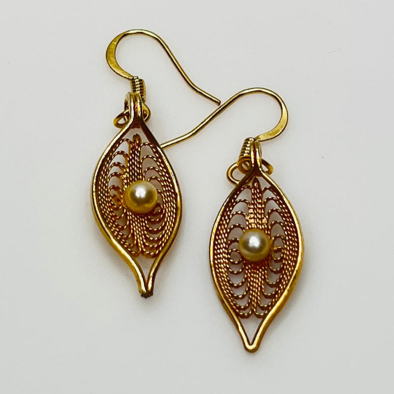 Upcycled vintage earrings with delicate leaf design and gold ear wires