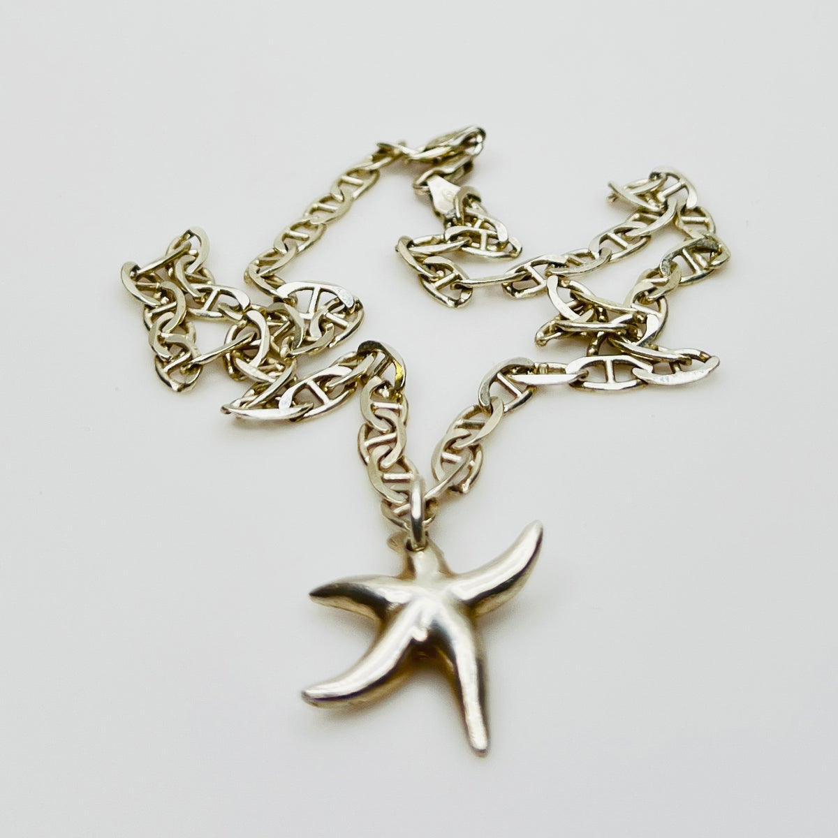 Detailed mariner link chain with starfish pendant in silver