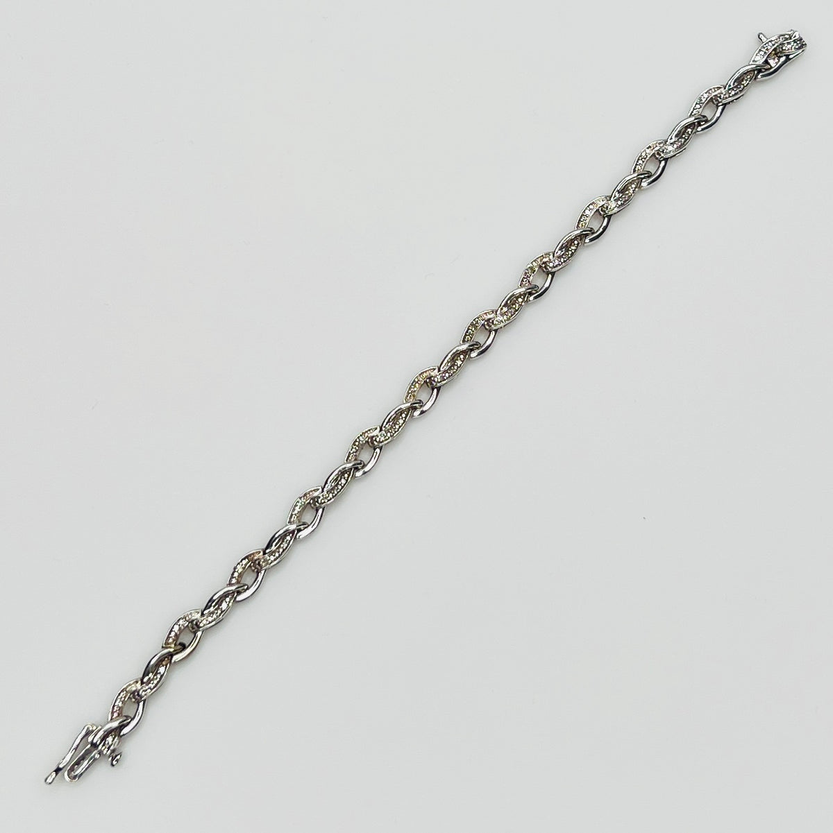 Full view of bracelet laid flat showing full length and clasp