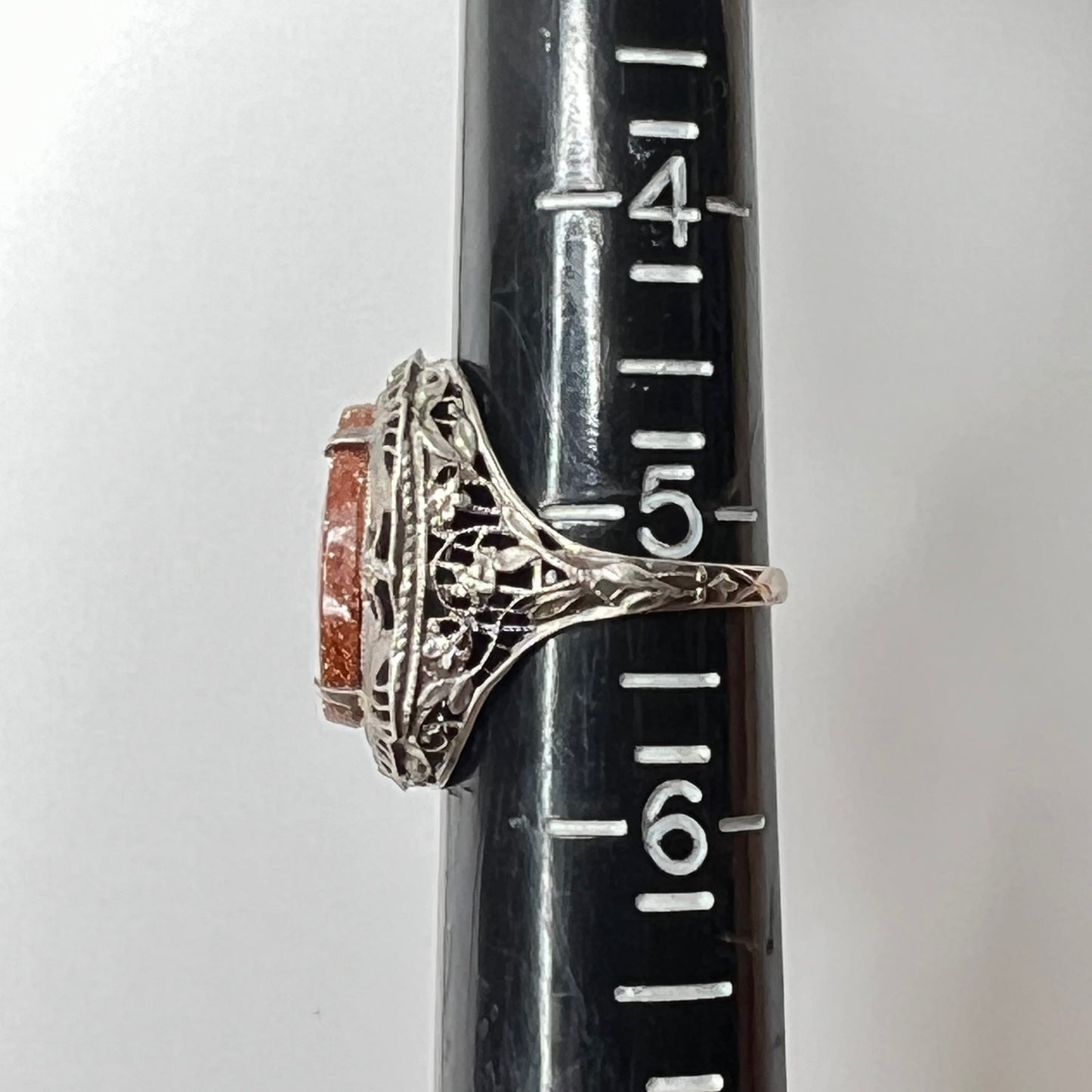 Statement vintage ring with ornate sterling floral filigree and oval goldstone